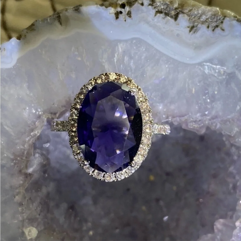 Sterling Silver amethyst prong set cocktail ring with gemstone halo bezel